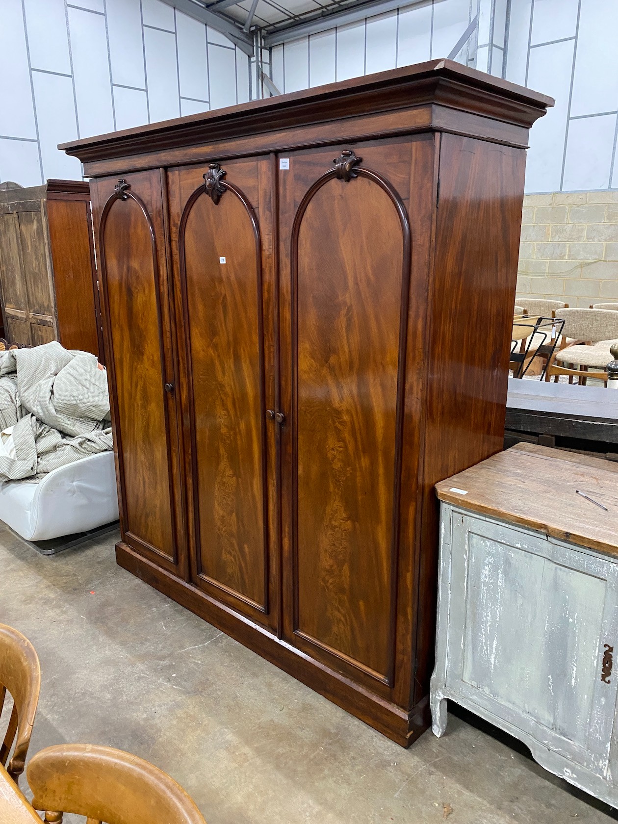 A Victorian mahogany compactum triple wardrobe, length 199cm, depth 65cm, height 208cm